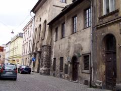 Józefa Street in Kazimierz district of Krakow with historic buildings and cobblestone pavement