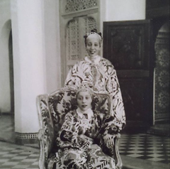 Lalla Mina El Mezouari El Glaoui seated in her Riad wearing traditional Moroccan Caftan, 1930s