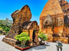 Ancient Cham Hindu temples complex on Mount Cù Lao in Nha Trang, Vietnam with brick towers dedicated to Ponagar, Shiva, Kartikeya, and Ganesha