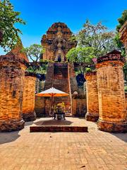 Cham-style Hindu temple complex with mandapa pillars and steep steps leading to Uma temple at Po Nagar, Nha Trang, Vietnam