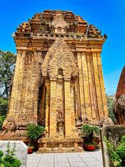 Po Nagar Hindu temples complex on Mount Cù Lao in Nha Trang, Vietnam showcasing four ancient Cham Hindu brick temples with a large central Cham tower dedicated to Uma (Parvati) and surrounding dedicated towers to Shiva, Kartikeya and Ganesha.