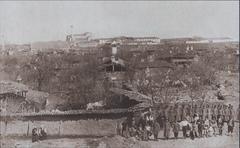 General panorama of Sofia in 1878 featuring Russian troops in the foreground and the Church of St. Sofia in the background