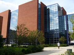 Lebow College of Business modern building exterior with glass windows and trees