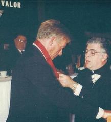 Peter T. DeMarco receiving Italian-American Medal of Valor at ceremony
