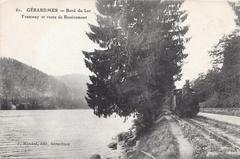 Tramway de Remiremont at Gérardmer lakeside station with scenic view of the lake and surrounding mountains