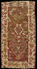 Traditional carpet from the Anonymous South Region with intricate geometric patterns in vibrant colors