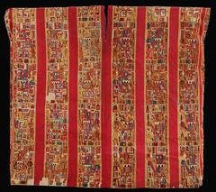 Huari style Unku textile with designs of stylized figures