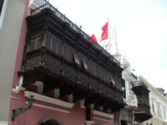 View of traditional Balcon limeño in Lima, Peru with ornate wooden balconies and colonial architecture