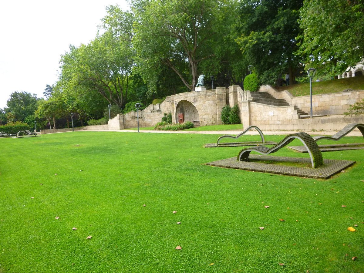 Park in A Coruña with tall trees and green grass