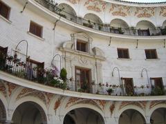 Sunday market in Seville mainly selling stamps and coins with residential floors above
