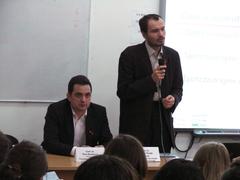 HIV debate in progress with participants discussing