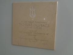Commemorative plaque honoring Colonel Priest Tadeusz Dłubacz at the Presidential Palace