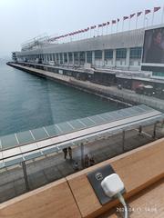 Front view of Eslite Bookstore window at Star House, Tsim Sha Tsui, Hong Kong with Ocean Terminal visible, April 2024
