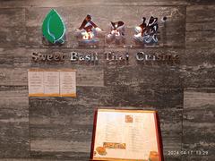 Harbour City Ocean Terminal mall in Tsim Sha Tsui Hong Kong with Sweet Basil Thai Restaurant in April 2024