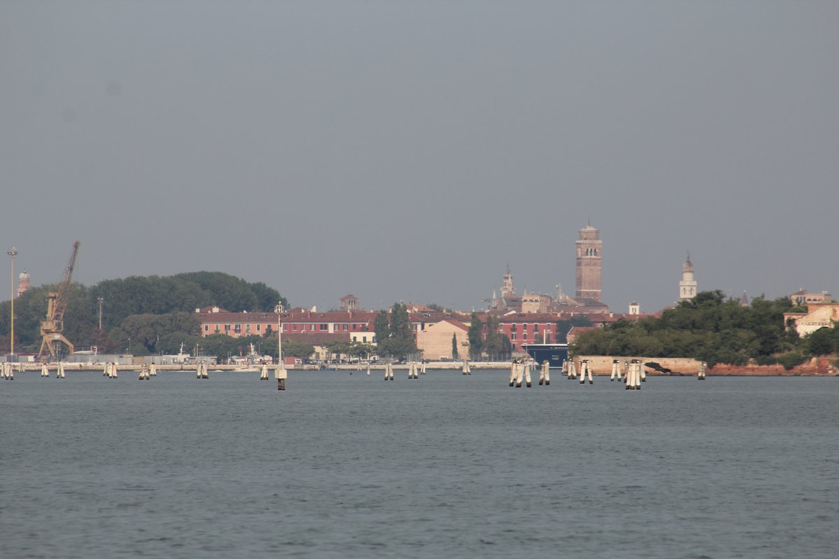 Harbour of Venice with boats and buildings in 2016