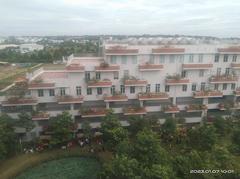 Aerial view of FPT University campus with modern buildings and greenery in Vietnam