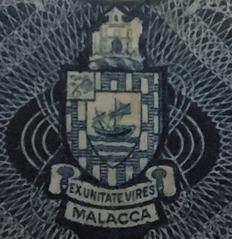 Colonial arms of Malacca from 1951 to 1959 shown on historic 1953 Malaya and British Borneo dollar banknote reverse side