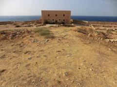 Historic building at the fortress of Rethymnon with stone walls and arched doorways