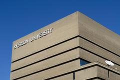 Ryerson University Library building with modern glass and brick architecture under a clear blue sky