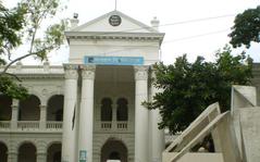 Administration Building of Jagannath University in Dhaka with clear blue sky