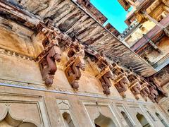 Jehangir Mahal Palace in Orchha Madhya Pradesh, an Indo-Islamic architectural marvel with colorful paintings, dome, chhatris and elephant brackets
