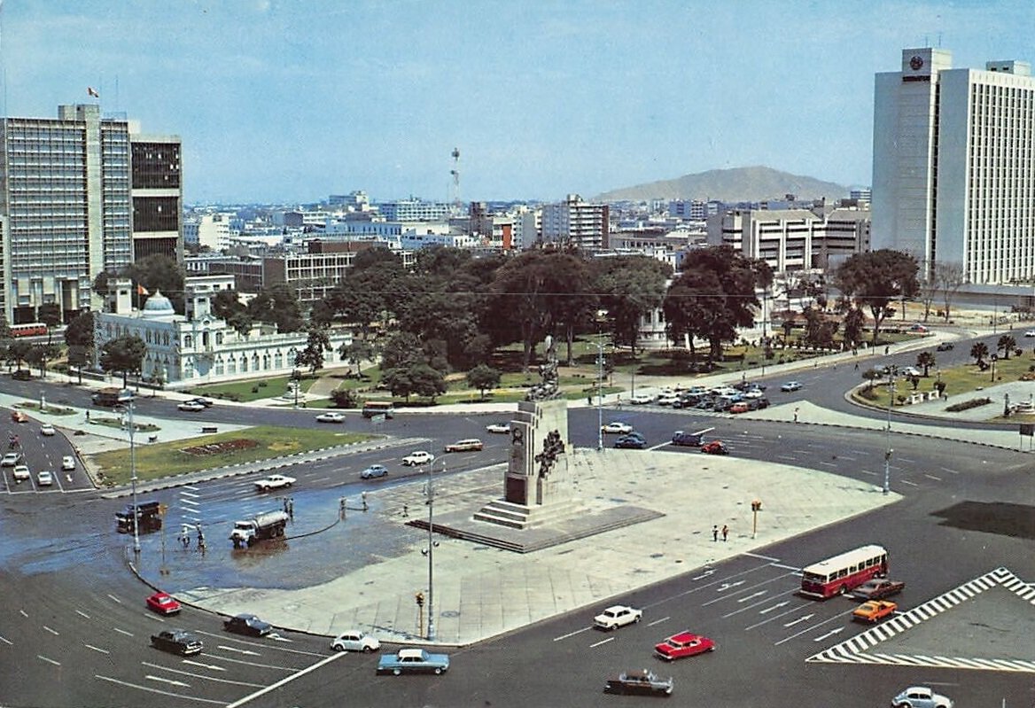 Panoramic view of the Monument to Miguel Grau in Lima historic centre with Museum of Italian Art, US Embassy, and Sheraton Hotel in background