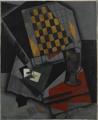 Cubist painting of a checkerboard and playing cards by Juan Gris