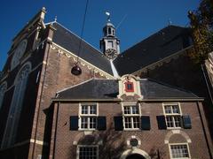 View of traditional Dutch houses and canal in Amsterdam Noordermarkt
