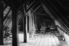Attic of St. Gabriel farm house in Montreal around 1910 showing rustic wooden beams and vintage interior