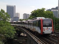AMY 35 train leaving Sultan Ismail LRT station in Kuala Lumpur on Sri Petaling Line