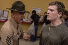Drill instructor correcting Marine recruit during receiving at Marine Corps Recruit Depot San Diego