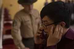 New Marine recruit making initial phone call home during receiving at Marine Corps Recruit Depot San Diego
