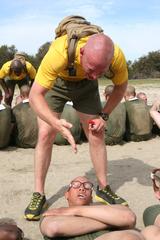 U.S. Marine Corps Sgt. Daniel C. Downing motivating recruit during physical fitness test at Marine Corps Recruit Depot San Diego