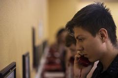 Marine recruit making first phone call home during receiving at Marine Corps Recruit Depot San Diego
