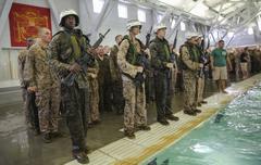 Marine recruits of Lima Company performing submerged gear strip training during Water Survival Qualification at Marine Corps Recruit Depot San Diego