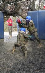 U.S. Marine Corps recruits competing in Pugil Sticks martial arts training at Marine Corps Recruit Depot San Diego