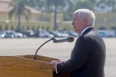 Defense Secretary Robert M. Gates speaking to newly enlisted Marines at graduation ceremony
