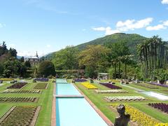 Terraced garden at Villa Taranto in Verbania with lush greenery and decorative plants