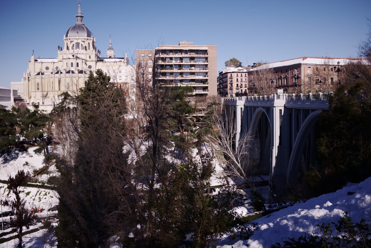 Viaducto de Segovia bridge in Madrid under cloudy sky