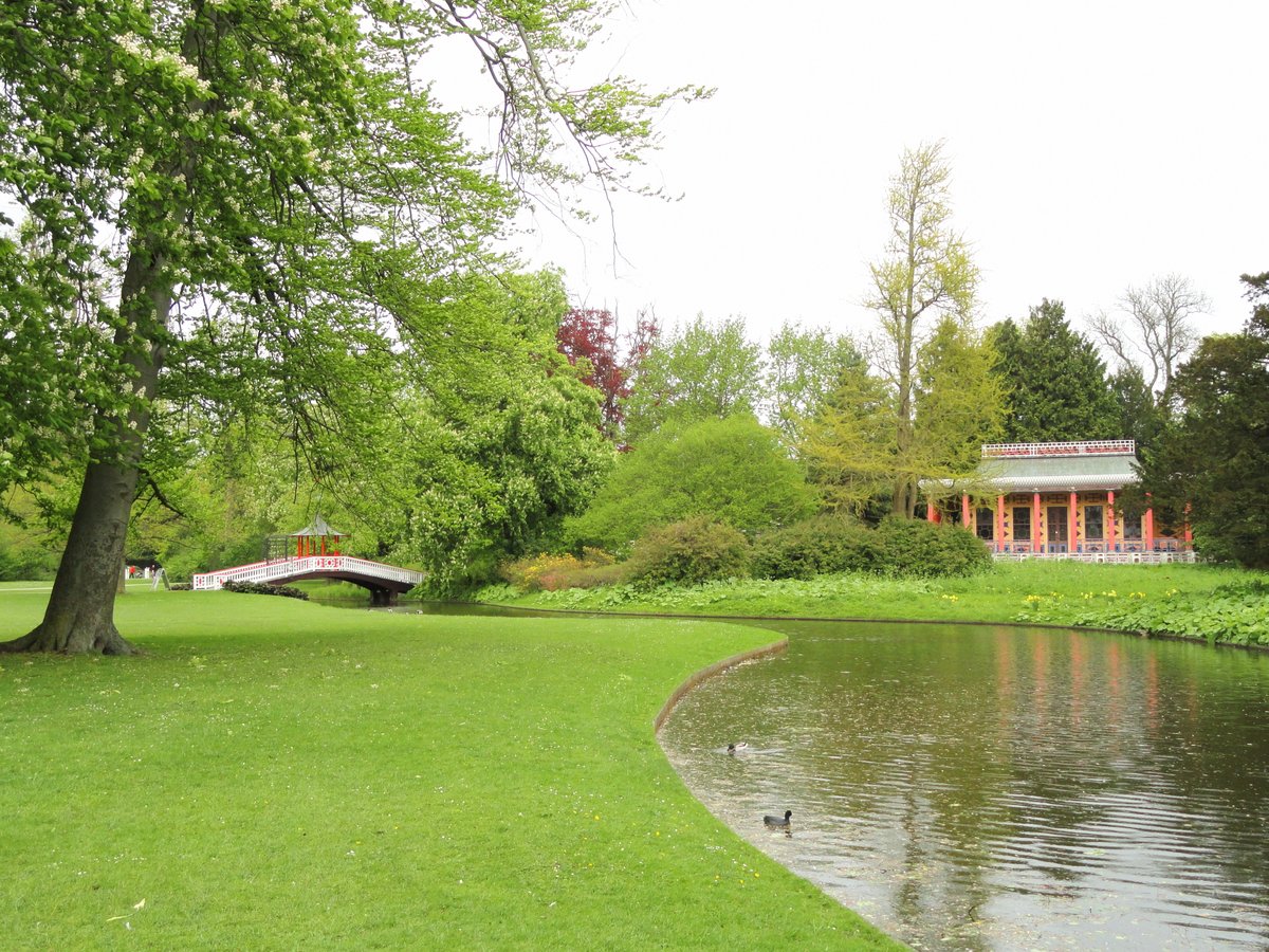 Scenic Chinese bridge and traditional teahouse in Frederiksberg Have park Copenhagen