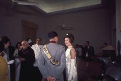First Lady Jacqueline Kennedy at dinner in India with Prime Minister Nehru and guests