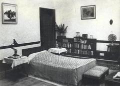 Jawaharlal Nehru's bedroom interior at Teen Murti House with vintage furniture and décor