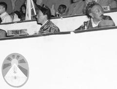 Tibetan delegates with Tibetan flag at 1947 Asian Relations Conference in Delhi as Mahatma Gandhi speaks