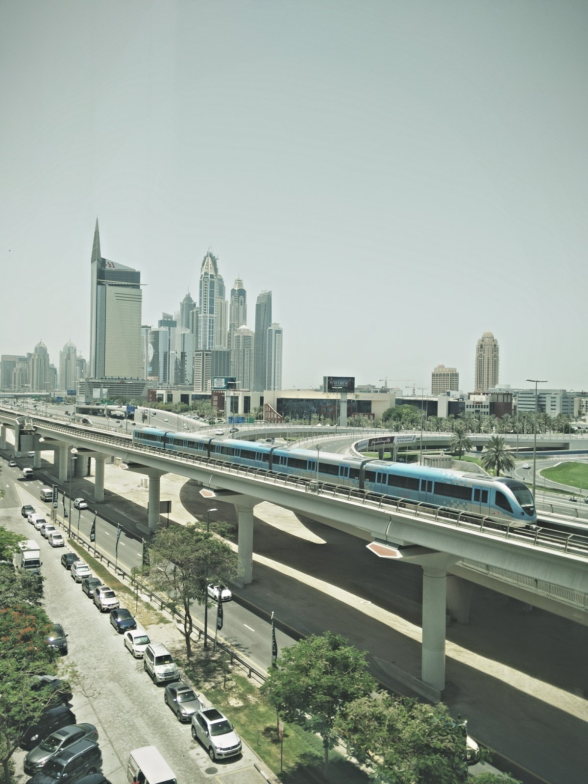 Sheikh Zayed Road and Dubai Metro Red Line in Dubai cityscape