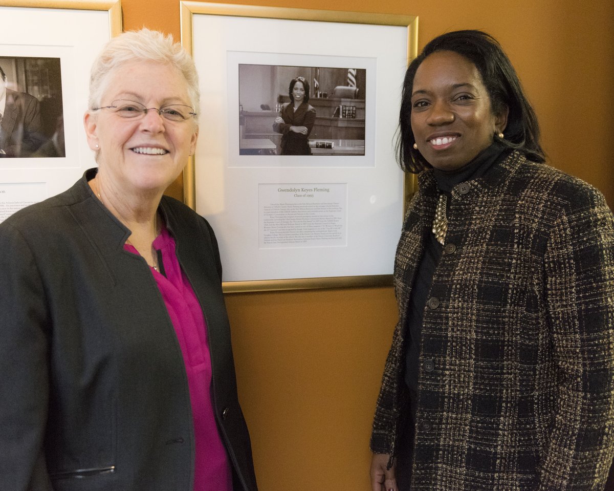 Administrator McCarthy and Chief of Staff Gwen Keyes Fleming reading Emory University School of Law distinguished alumni biography
