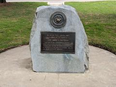 Commemorative plaque for Camp Matthews on a rock slab in Town Square at UC San Diego