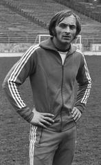 Roger Van Gool, trainer Guy Thijs, and Jan Ceulemans during a training session of the Belgian national football team in Brussels with the Atomium monument in the background, March 23, 1977