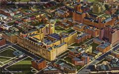 Aerial view of Cook County Hospital building with surrounding cityscape