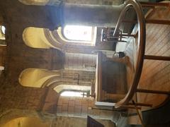 Interior view of a chapel room with medieval architecture inside the Tower of London