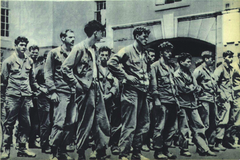 First American soldiers captured in Korean War standing outside City Hall of Seoul July 1950